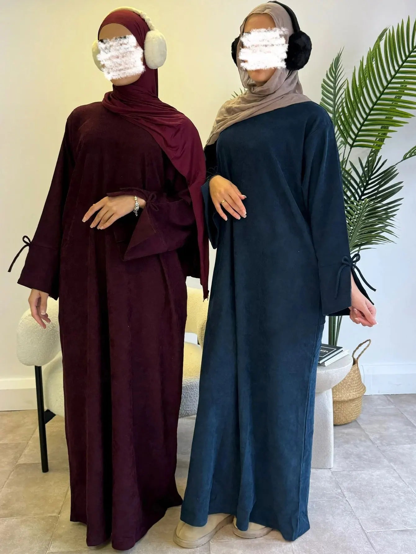 عباية  تجمع بين الأناقة والاحتشام بتصميم كعكة مميز مع حزام فاخر من القماش المدبوغ.